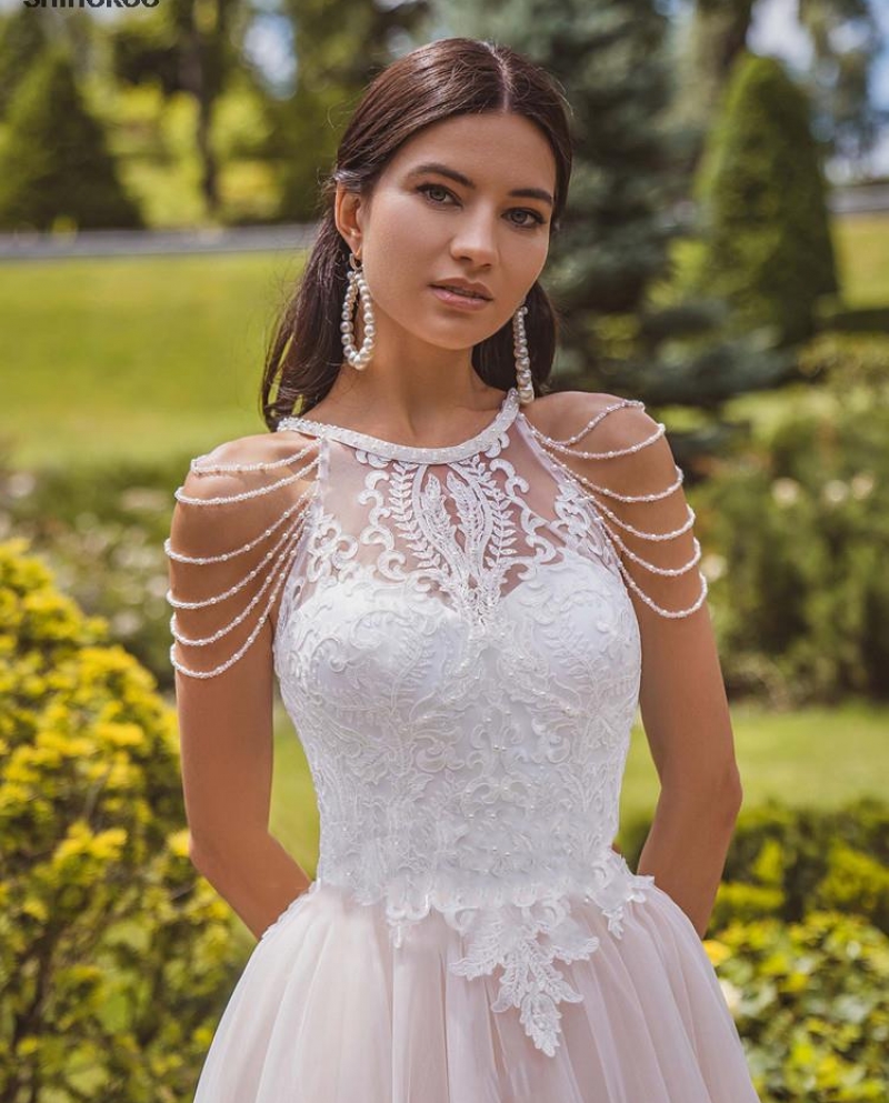 KIA, A-line wedding dress with halter neck