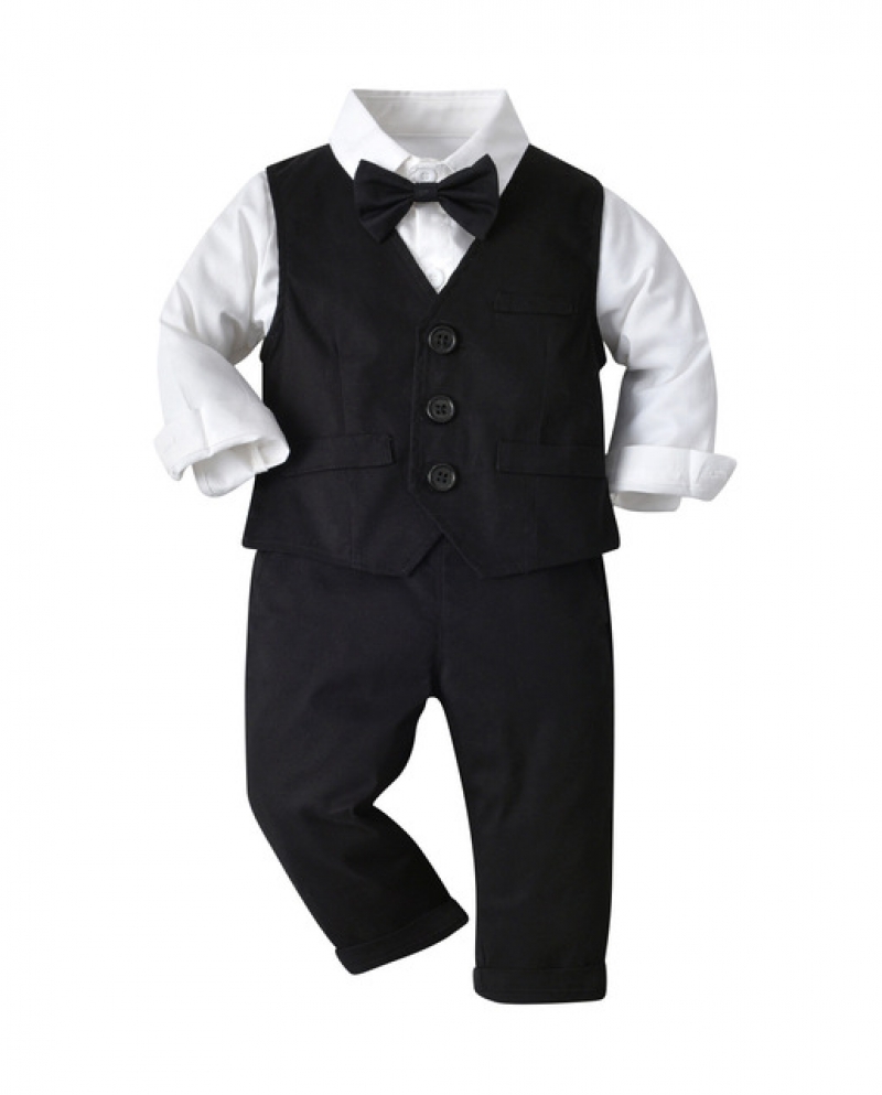 Un Muchacho Preescolar En Una Camisa Blanca, Un Chaleco Negro Y Pantalones  Foto de archivo - Imagen de persona, joven: 114277990