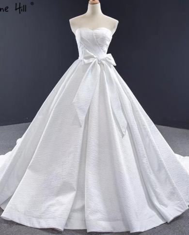 فساتين زفاف بيضاء بسيطة بلا أكمام طويلة القوس معطلة الكتف الدانتيل يصل أثواب الزفاف Serene Hill Hm67061 فستان الزفاف