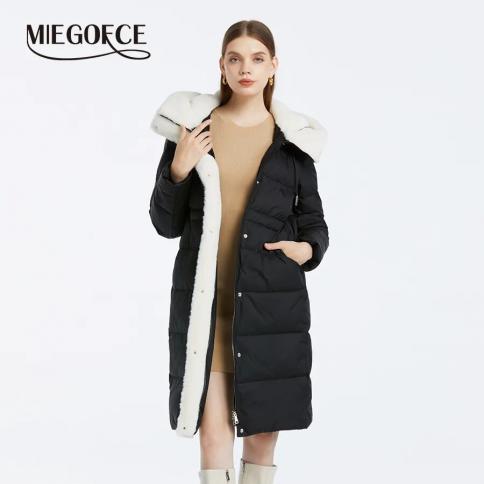 Miegofce 2023 coleção de inverno simples casaco longo com capuz jaqueta à prova de vento feminino pele sintética costura design 