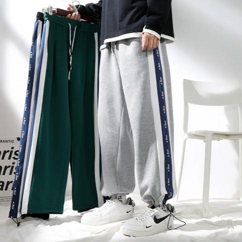 New Hip Hop Streetwear Pantaloni larghi larghi Pantaloni sportivi casual primaverili Pantaloni stile harem patchwork con lettera